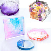 Assorted handmade resin coasters with floral, glitter, and marble patterns in various shapes.