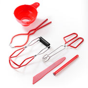 Set of red and silver professional sugar art and confectionery tools on a white background