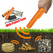 Orange handheld metal detector searching for gold nuggets and coins underground