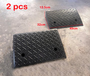 Two black rubber car ramps with diamond tread pattern, 49cm x 32cm x 13.5cm
