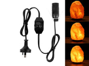 Himalayan salt lamp with adjustable dimmer switch and black power cord.