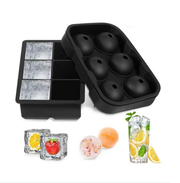 Black silicone ice cube trays for square and spherical ice with fruit-infused ice examples