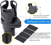 Black shockproof car cup holder with non-slip sponge pads for stability.