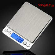 Digital precision pocket scale with stainless steel platform and blue LCD display