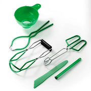 Green professional waxing kit with wax pot, spatulas, and various hair removal tools