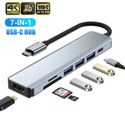 7-in-1 USB-C Hub with HDMI, USB ports, SD card slots, and 4K Ultra HD support.